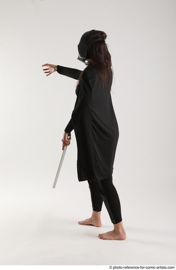 Woman Adult Average White Fighting with sword Standing poses Coat