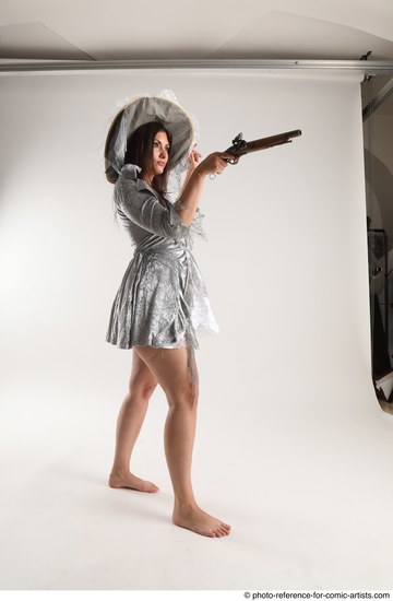 Woman Adult Athletic White Fighting with gun Standing poses Casual