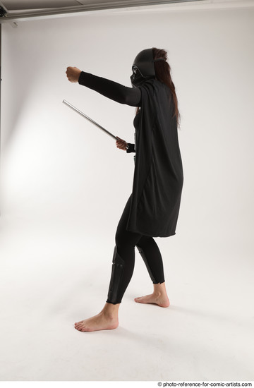 Woman Adult Average White Fighting with sword Standing poses Coat