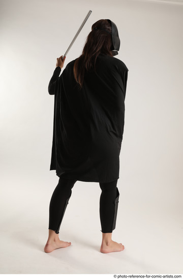 Woman Adult Average White Fighting with sword Standing poses Coat