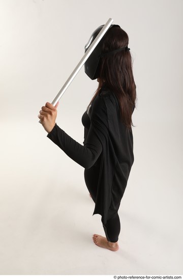 Woman Adult Average White Fighting with sword Standing poses Coat