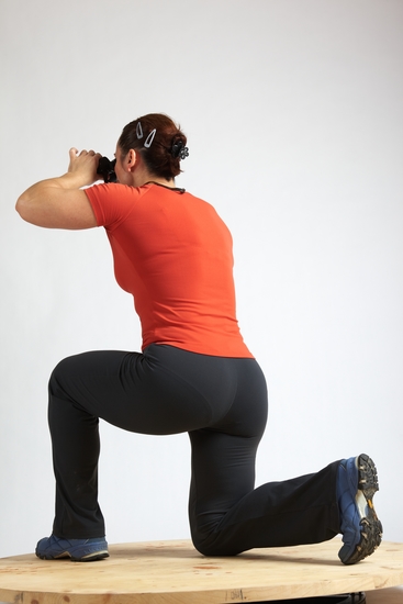 Woman Adult Average White Neutral Kneeling poses Casual