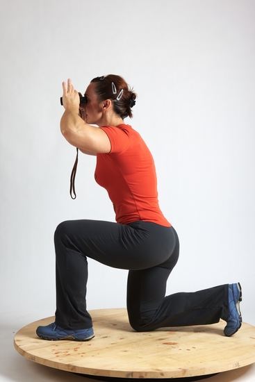 Woman Adult Average White Neutral Kneeling poses Casual