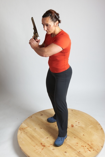 Woman Adult Average White Fighting with gun Standing poses Casual