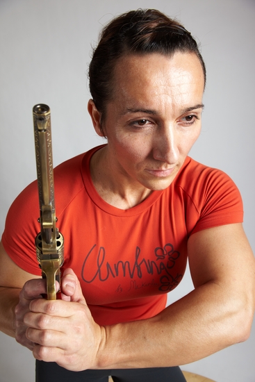 Woman Adult Average White Fighting with gun Standing poses Casual