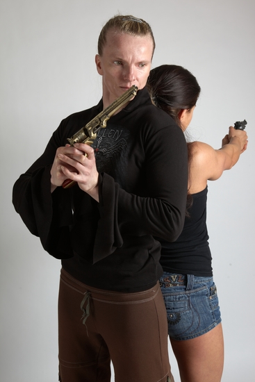 Adult Average White Fighting with gun Standing poses Casual Women