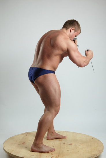 Man Adult Muscular White Fighting with knife Standing poses Underwear