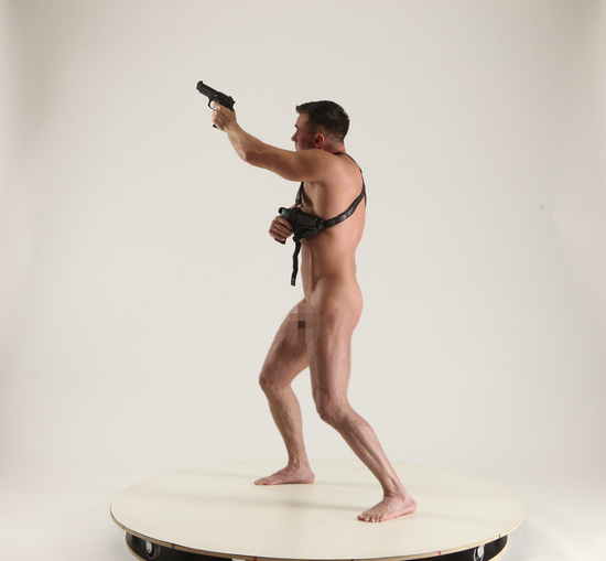 Man Adult Muscular White Fighting with gun Standing poses Underwear