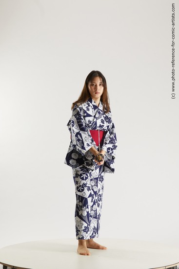 Woman Young Athletic Fighting with sword Asian Costumes