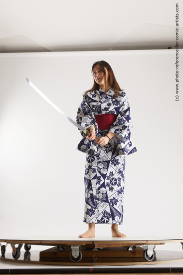 Woman Young Athletic Fighting with sword Asian Costumes