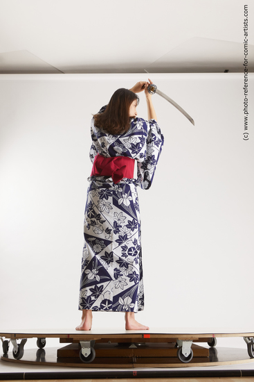 Woman Adult Average Fighting with sword Standing poses Asian Costumes