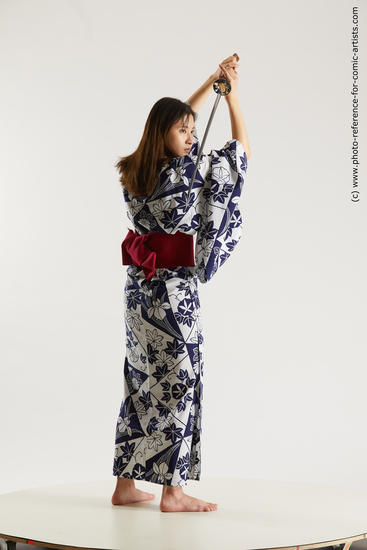 Woman Adult Average Fighting with sword Standing poses Asian Costumes