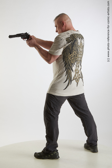 Man Adult Average White Fighting with gun Standing poses Casual