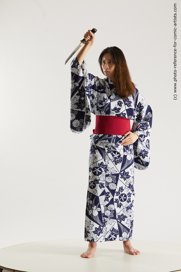 Woman Young Athletic Standing poses Asian Costumes