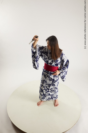 Woman Young Athletic Standing poses Asian Costumes