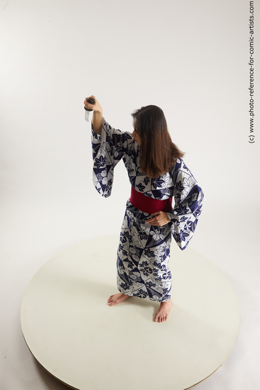 Woman Young Athletic Standing poses Asian Costumes