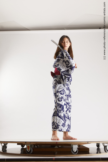 Woman Young Athletic Fighting with sword Standing poses Asian Costumes