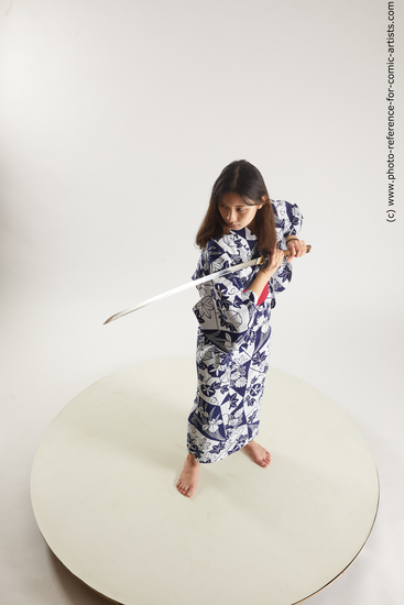 Woman Young Athletic Fighting with sword Standing poses Asian Costumes