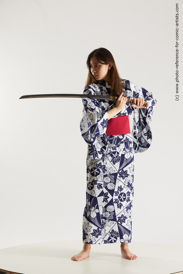 Woman Young Athletic Fighting with sword Standing poses Asian Costumes