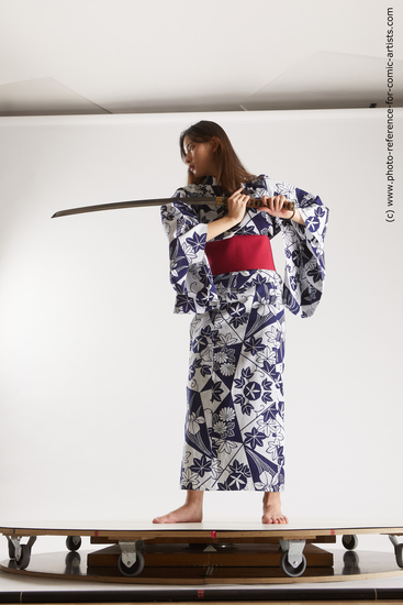 Woman Young Athletic Fighting with sword Standing poses Asian Costumes