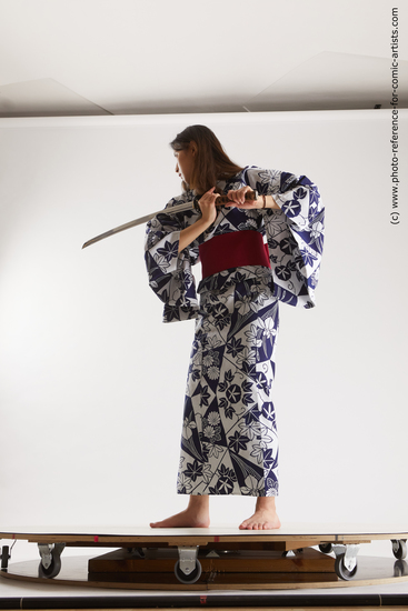 Woman Young Athletic Fighting with sword Standing poses Asian Costumes