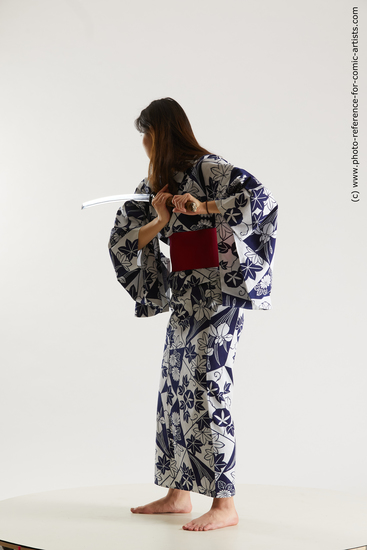 Woman Young Athletic Fighting with sword Standing poses Asian Costumes