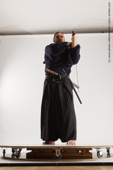 Man Adult Average White Fighting with sword Standing poses Costumes