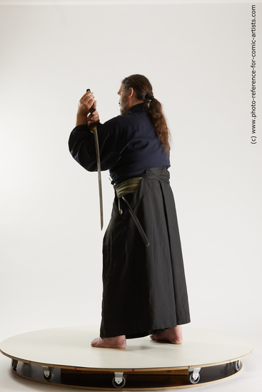 Man Adult Average White Fighting with sword Standing poses Costumes