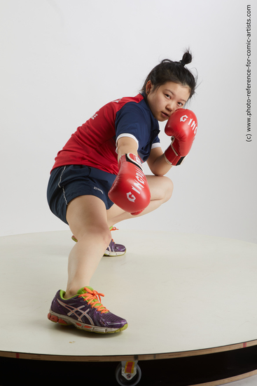 Woman Young Average Kneeling poses Sportswear Asian