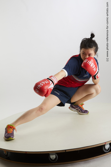 Woman Young Average Kneeling poses Sportswear Asian