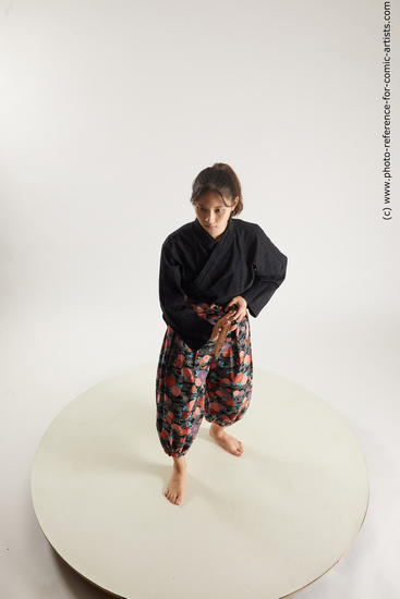 Woman Young Athletic Fighting with sword Standing poses Asian Costumes