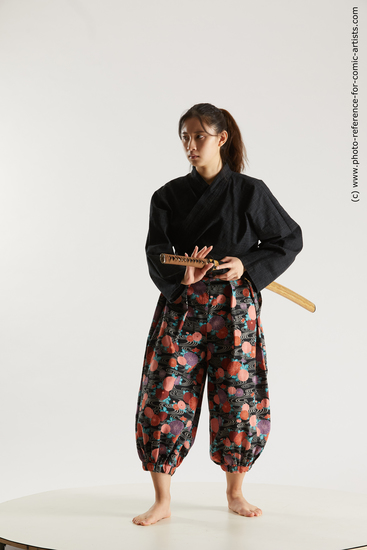 Woman Young Athletic Fighting with sword Standing poses Asian Costumes