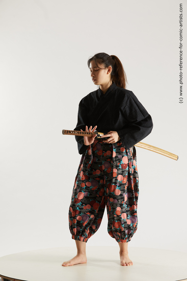 Woman Young Athletic Fighting with sword Standing poses Asian Costumes