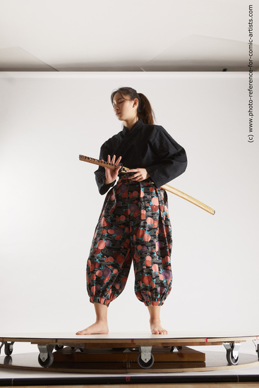 Woman Young Athletic Fighting with sword Standing poses Asian Costumes