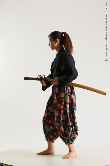 Woman Young Athletic Fighting with sword Standing poses Asian Costumes