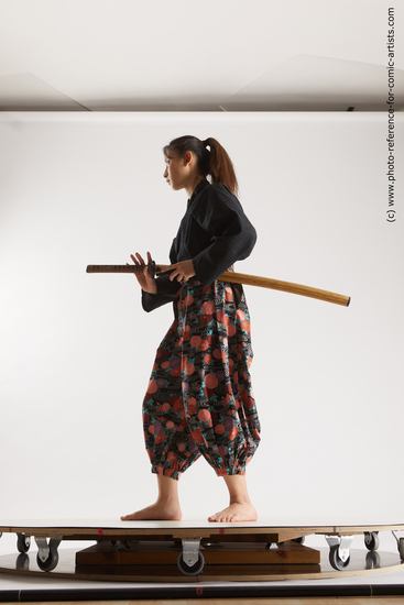 Woman Young Athletic Fighting with sword Standing poses Asian Costumes