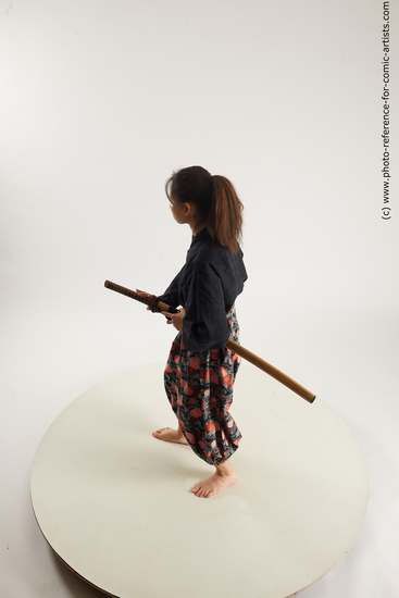 Woman Young Athletic Fighting with sword Standing poses Asian Costumes