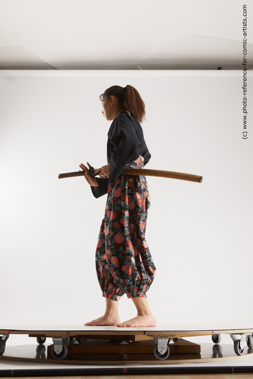 Woman Young Athletic Fighting with sword Standing poses Asian Costumes