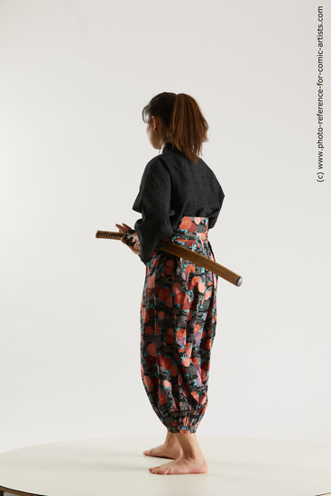 Woman Young Athletic Fighting with sword Standing poses Asian Costumes