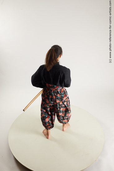 Woman Young Athletic Fighting with sword Standing poses Asian Costumes