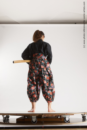 Woman Young Athletic Fighting with sword Standing poses Asian Costumes