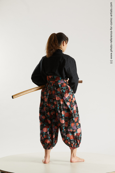 Woman Young Athletic Fighting with sword Standing poses Asian Costumes