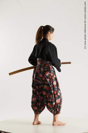 Woman Young Athletic Fighting with sword Standing poses Asian Costumes