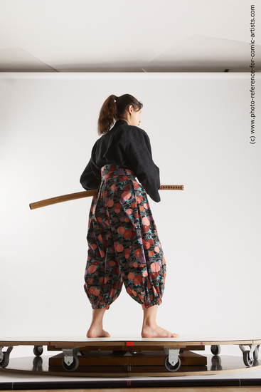 Woman Young Athletic Fighting with sword Standing poses Asian Costumes