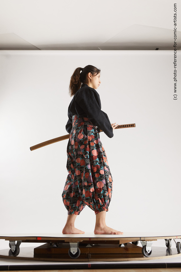 Woman Young Athletic Fighting with sword Standing poses Asian Costumes