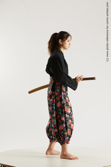 Woman Young Athletic Fighting with sword Standing poses Asian Costumes