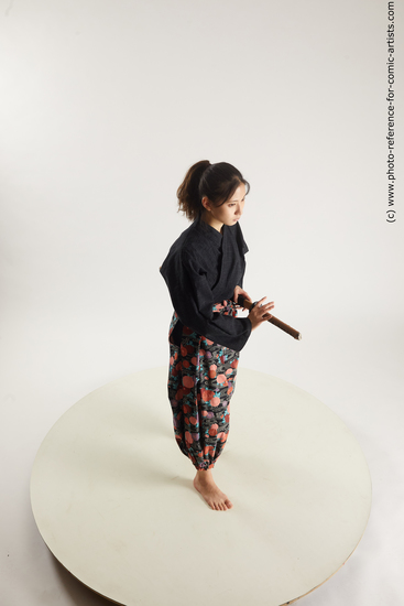 Woman Young Athletic Fighting with sword Standing poses Asian Costumes