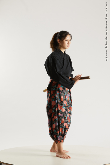 Woman Young Athletic Fighting with sword Standing poses Asian Costumes