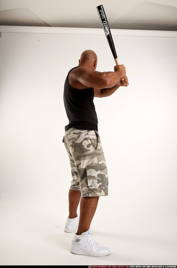 Man Adult Athletic Black Standing poses Casual Fighting with bat