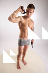 Piero Pose with Guns 10